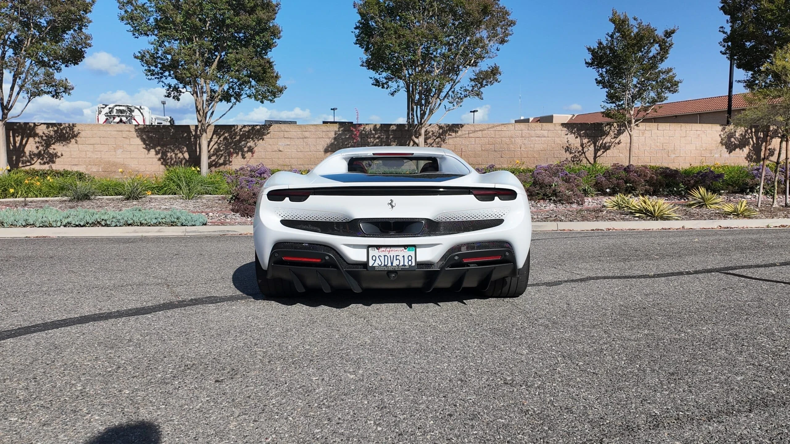 Ferrari 296 GTB detail relevant to hybrid supercar rentals on THE LUX CAR